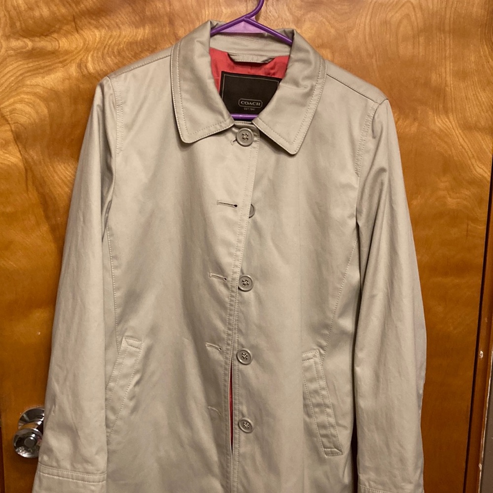 COACH LIGHT-WEIGHT JACKET. CORAL COLOR LINING. TWO POCKETS/FRONT. NO CALL-OUTS.